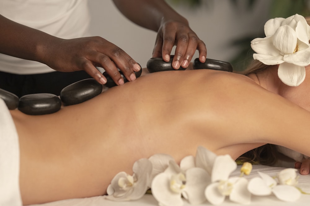 Smooth basalt stones arranged for a relaxing treatment